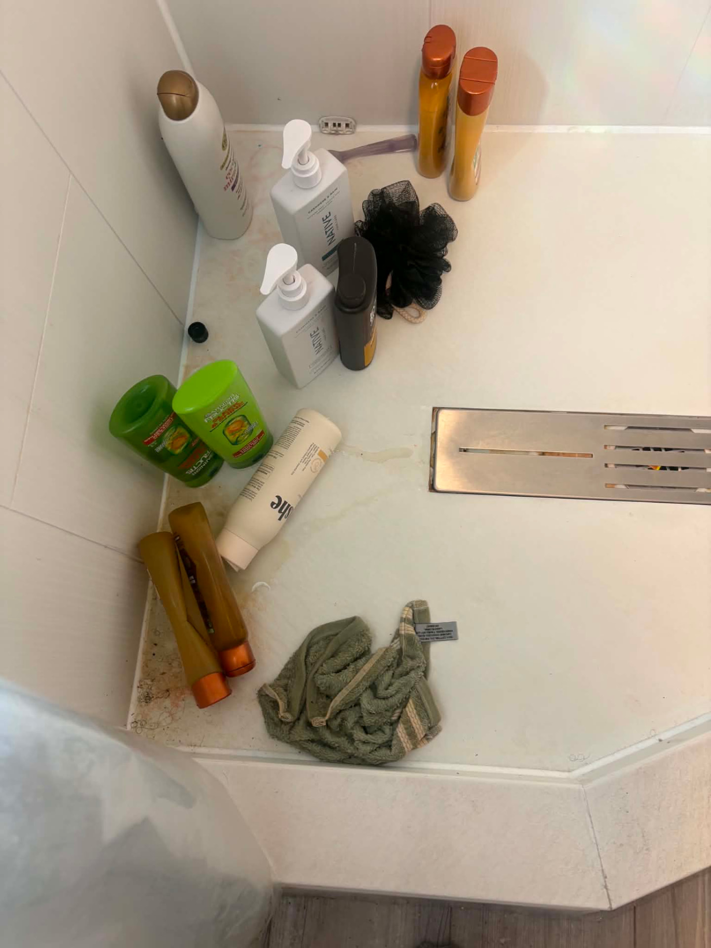 Shower floor before cleaning